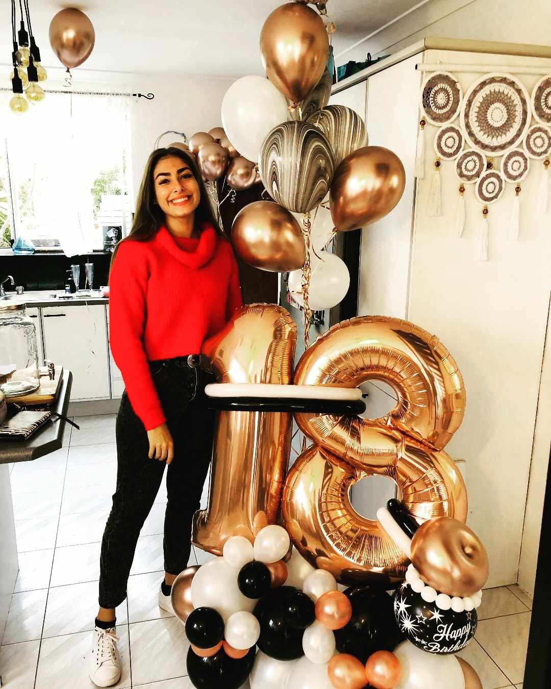 Double digit balloon decoration. Balloon marquee with 2 Large foil balloon numbers, happy birthday balloon and helium balloon marquee. Designs may vary.