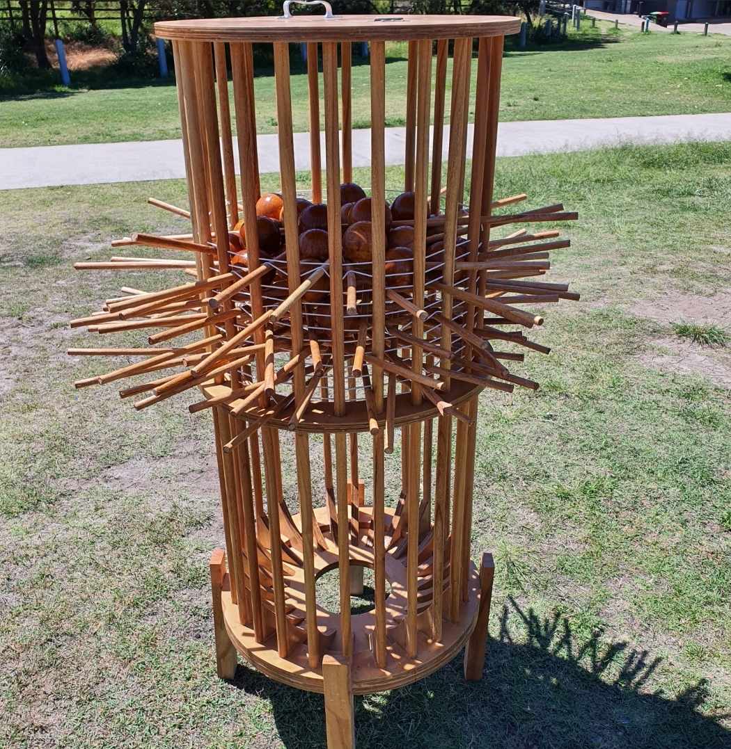 Giant Kerplunk lawn game displayed outside, perfect entertainment at your next birthday, wedding or engagement party