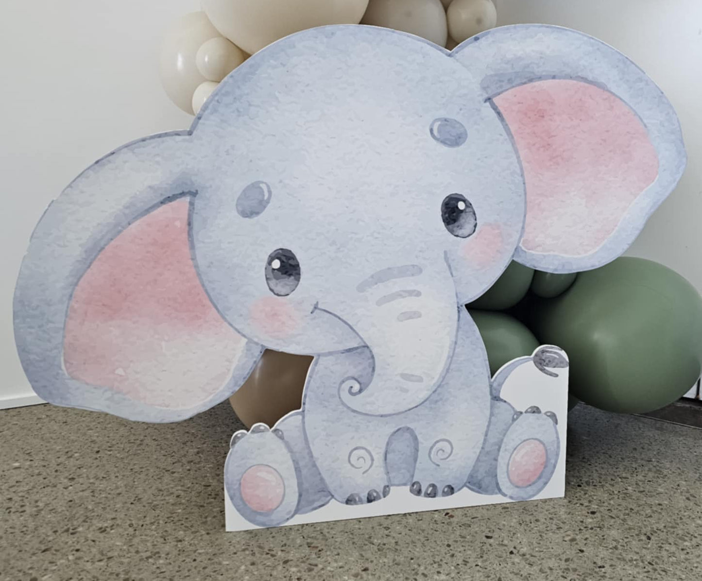 Cardboard elephant cutout perfect for a Wild One first birthday party