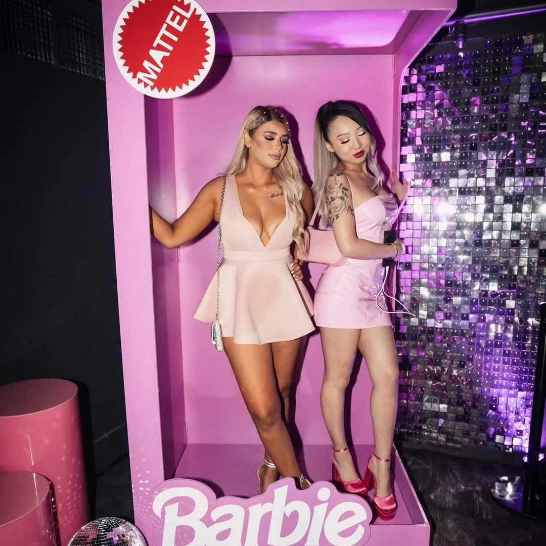 Our hot pink photobooth used as a photo opportunity for a nightclub themed event. pictured with our hot pink plinths and mirror balls, great props for Hens party or Bridal Shower