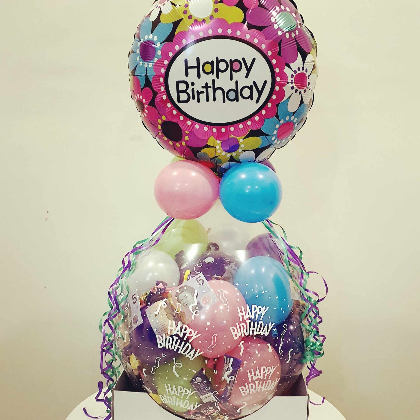 Stuffed balloon gift for teenager, child or as a get well soon gift. Filled with chocolates and money or gift cards as an optional extra. Foil balloon topper included (Designs may vary)