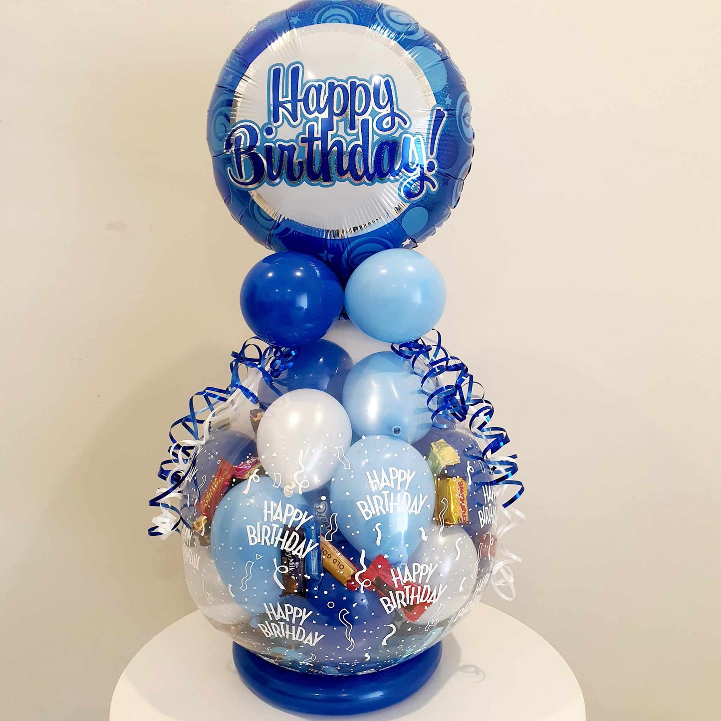 Stuffed balloon gift for boy or girl. Foil balloon topper included. Filled with chocolates and option to add  money or gift cards 